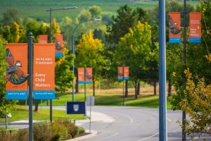 Every Child Matters banners hanging on University Way